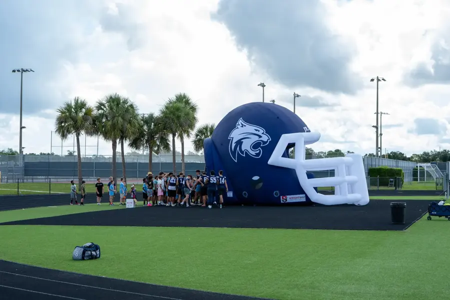 The Bobcats' giant inflatable helmet on the field at training camp