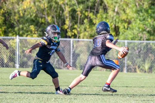 10U Bobcats punt during a home game