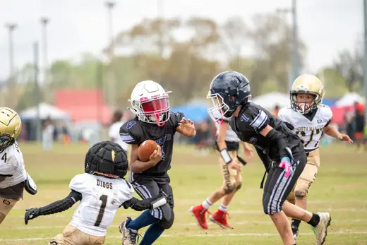 Bobcats tackle football game action