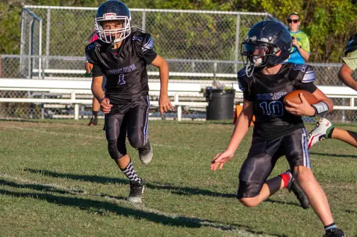 Bobcats tackle football game action