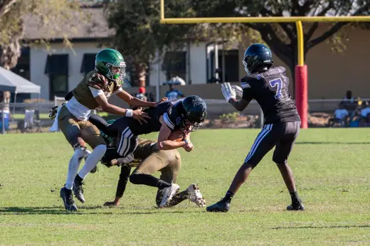 Bobcats tackle football game action