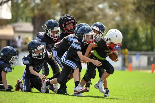 Bobcats tackle football game action