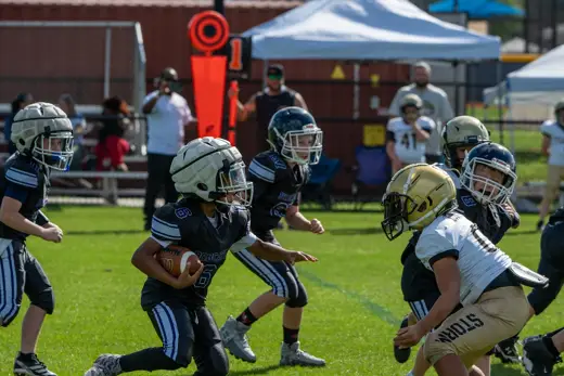 Bobcats tackle football game action