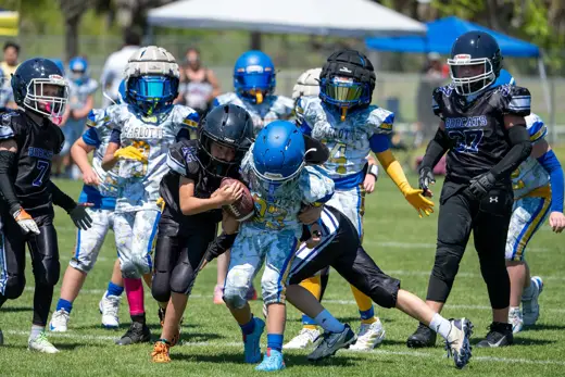 Bobcats tackle football game action